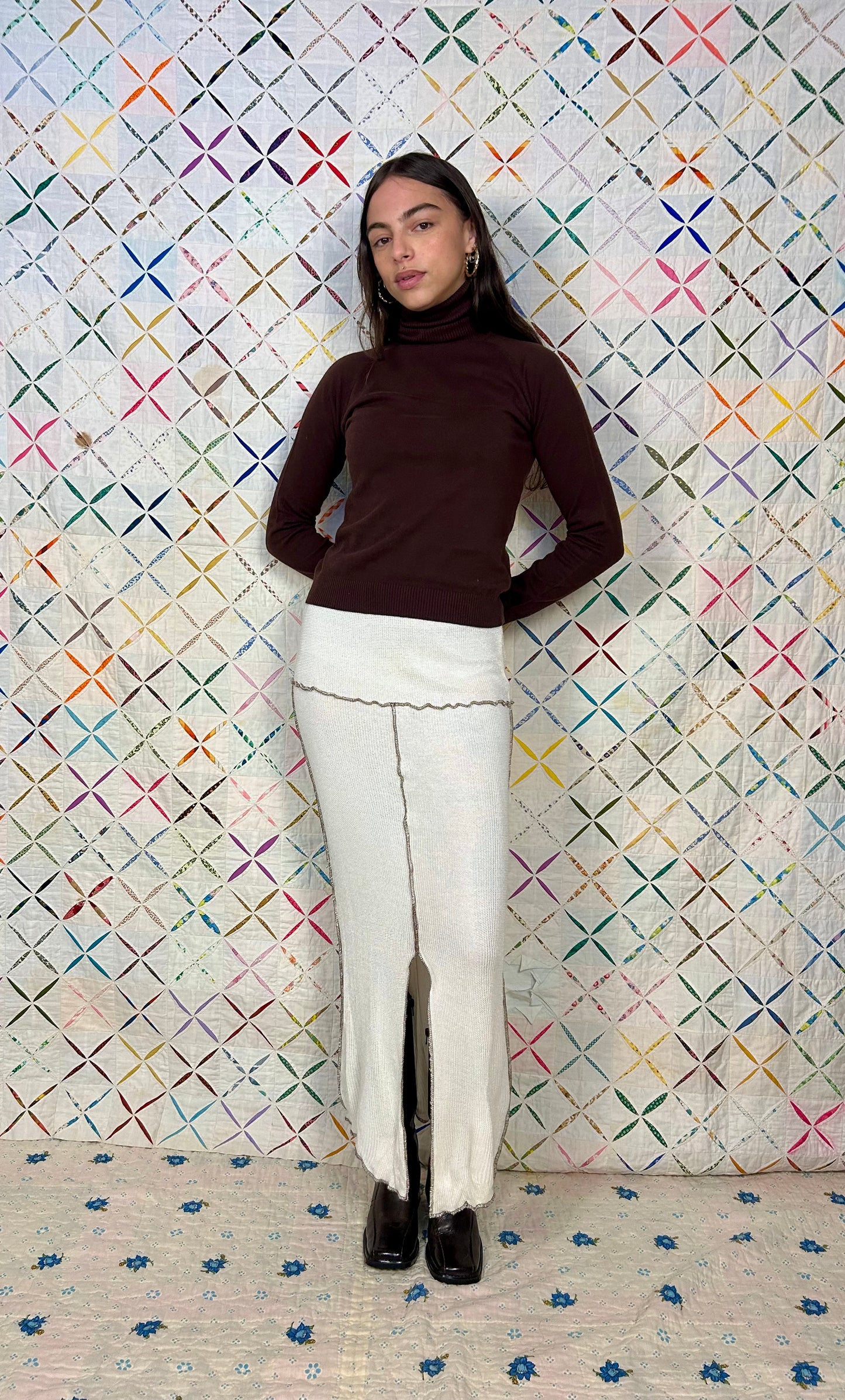 Cream knit maxi skirt with exposed seams