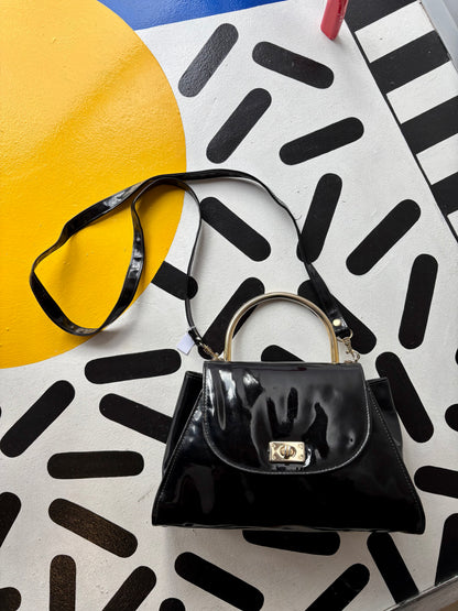 Black shiny purse with clasp