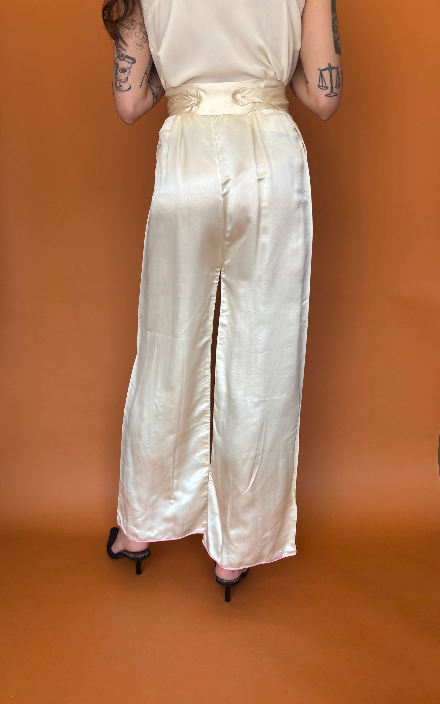 Ivory satin trousers with button waist