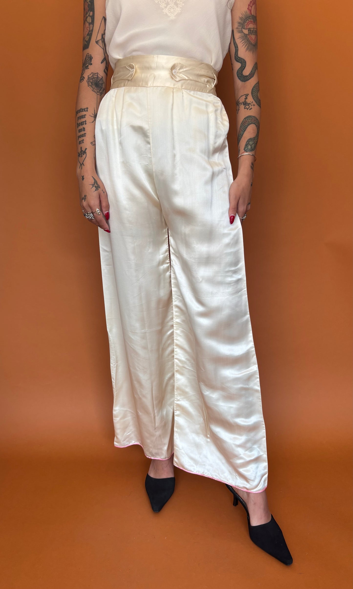 Ivory satin trousers with button waist